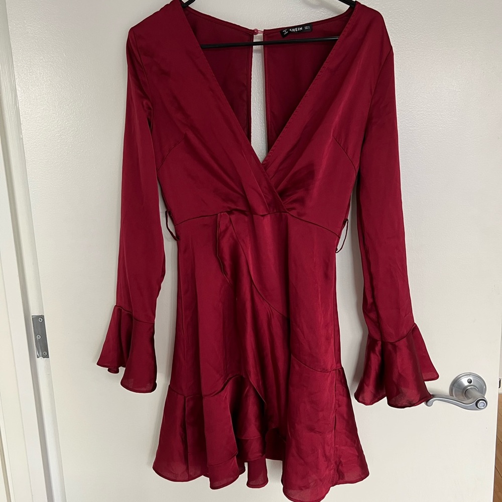 Satin red long sleeve dress.